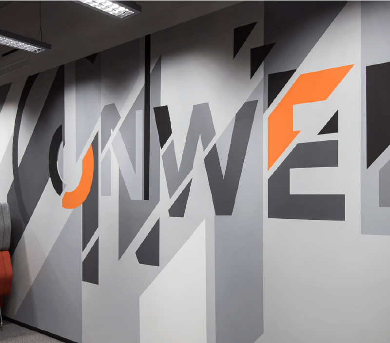identyfikacja-wizualna-firmy-onwelo-logo-malaowane-w-formie-muralu